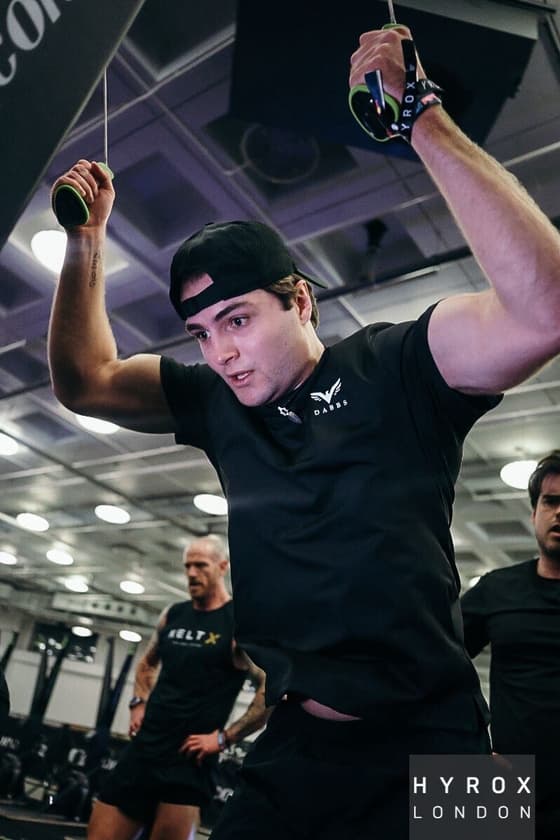 Athlete lifting a kettlebell overhead