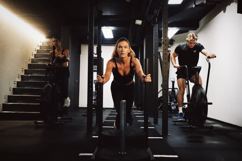 Athlete pushing a sled